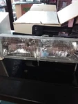 Tyc 20-1668-00 Headlight Assembly Right Side Gmc Aftermarket New In Box. Fixed Price $44.23.